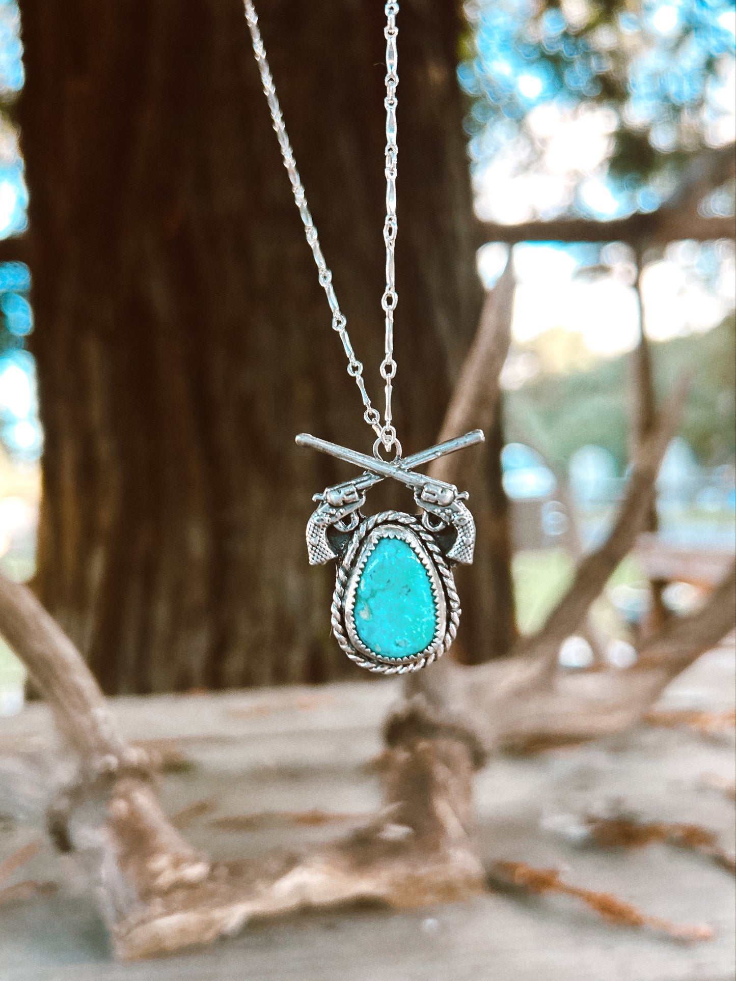 The Turquoise Pistol Pendant